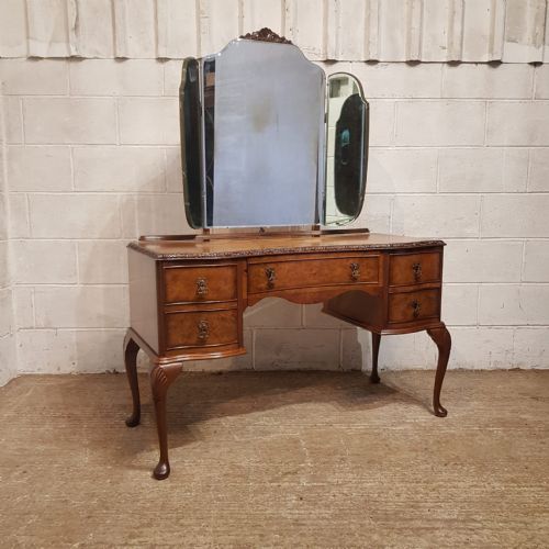 fig 2. A QUEEN ANNE STYLE SERPENTINE FRONTED BURR WALNUT DRESSING TABLE C1920