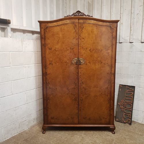 A BURR WALNUT DOUBLE WARDROBE C1920