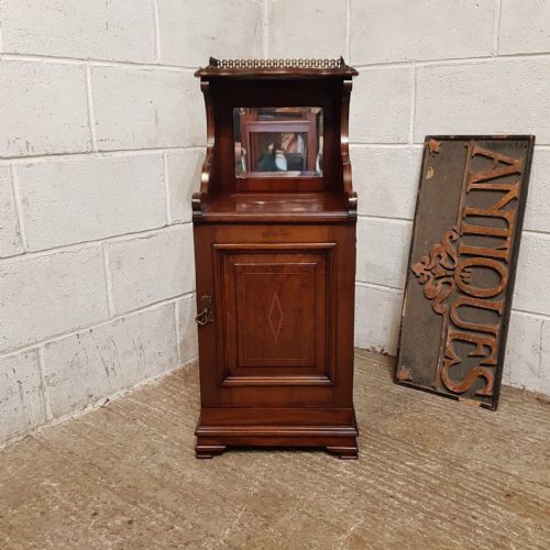 A LATE VICTORIAN MAHOGANY BEDSIDE CABINET C1900