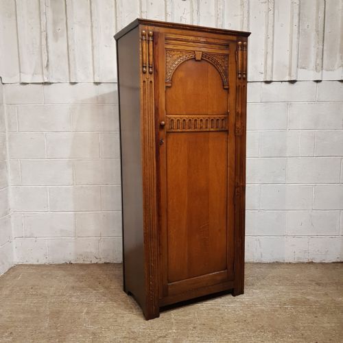 fig 1. AN OAK HALL WARDROBE C1920