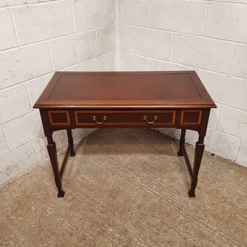 AN EDWARDIAN MAHOGANY WRITING TABLE C1900