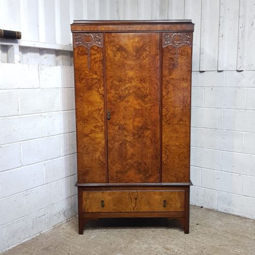 A BURR WALNUT SINGLE WARDROBE C1920