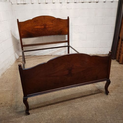 A BURR WALNUT DOUBLE BED STEAD C1920