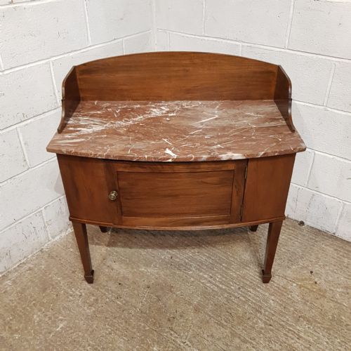 A VICTORIAN BOW FRONTED MARBLE TOPPED WASH STAND C1880