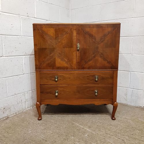 A Burr Walnut Tallboy C1920