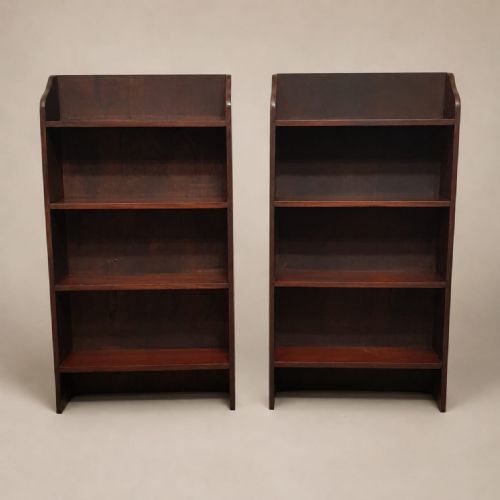 A PAIR OF SMALL MAHOGANY OPEN BOOKCASES C1920