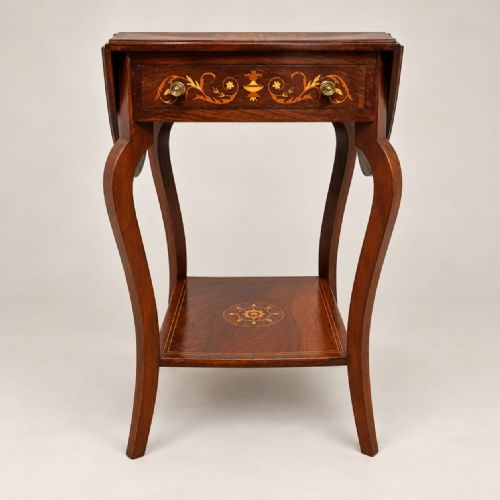 fig 1. A Victorian rosewood drop leaf occasional table featuring marquetry floral inlay on the drawer, slender cabriole legs, and a lower shelf with a central inlaid medallion.
