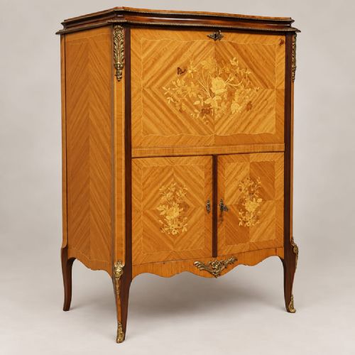 A Serpentine Fronted Walnut and Mahogany Cocktail Cabinet C1920