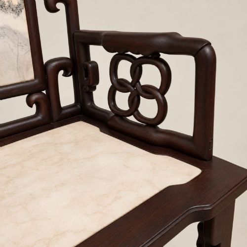 fig 2. A late Qing dynasty Chinese dark hardwood armchair featuring an inlaid mottled marble backrest panel and seat.