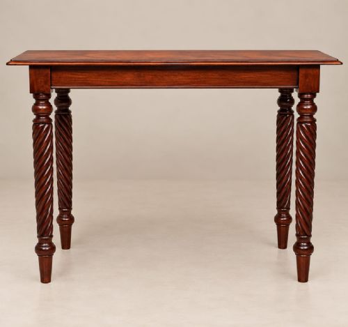fig 2. A late Victorian mahogany console table featuring a rectangular top with a moulded edge and four barley twist turned legs.