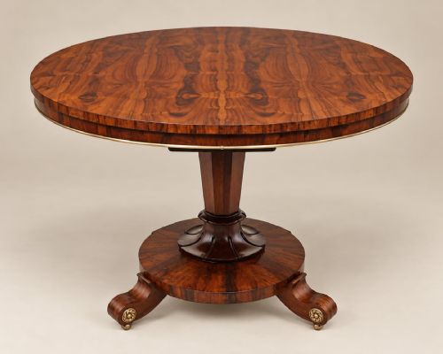 A WM 4th CIRCULAR ROSEWOOD DINING TABLE C1830