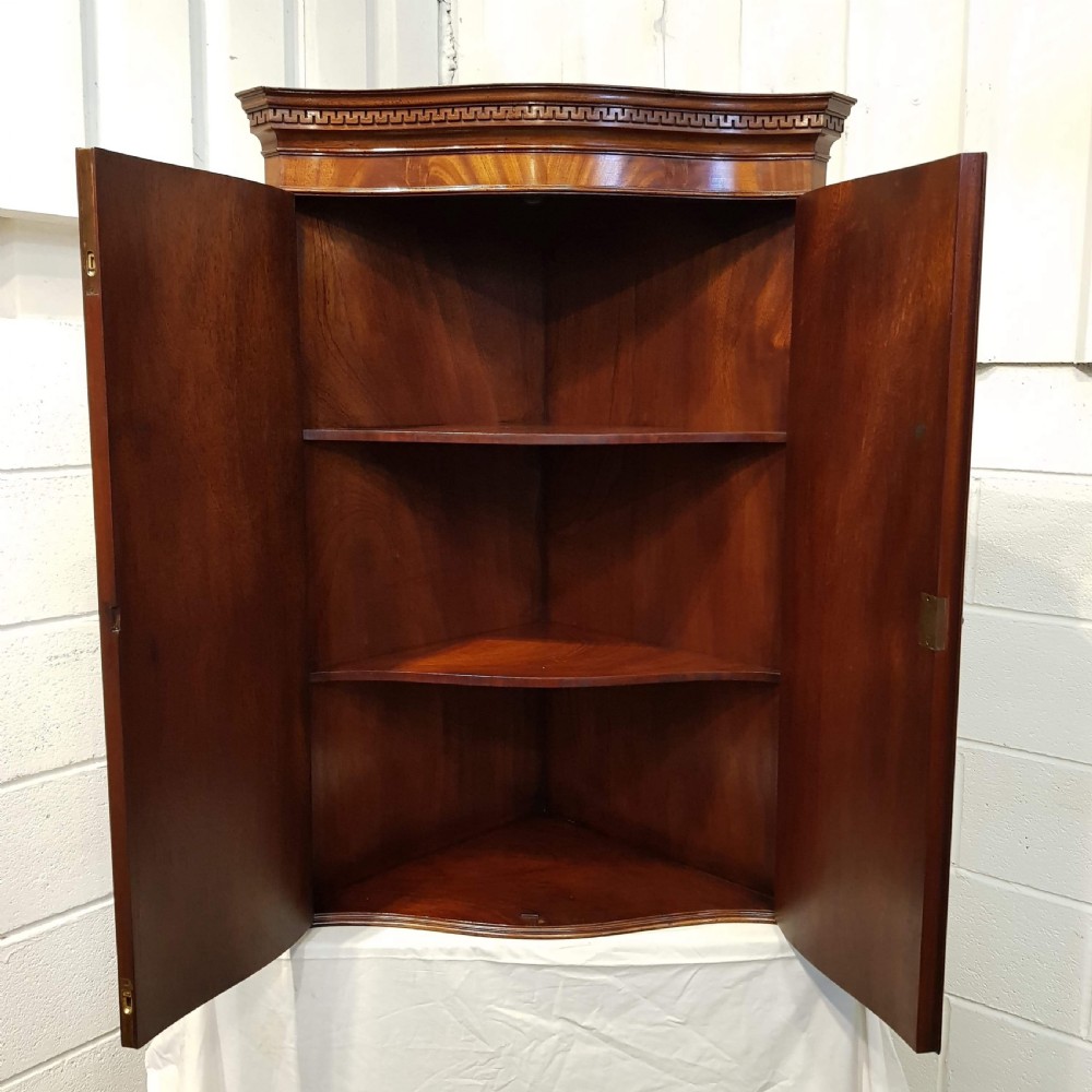 ANTIQUE FLAMED MAHOGANY SERPENTINE FRONT HANGING CORNER CABINET C1920 View II