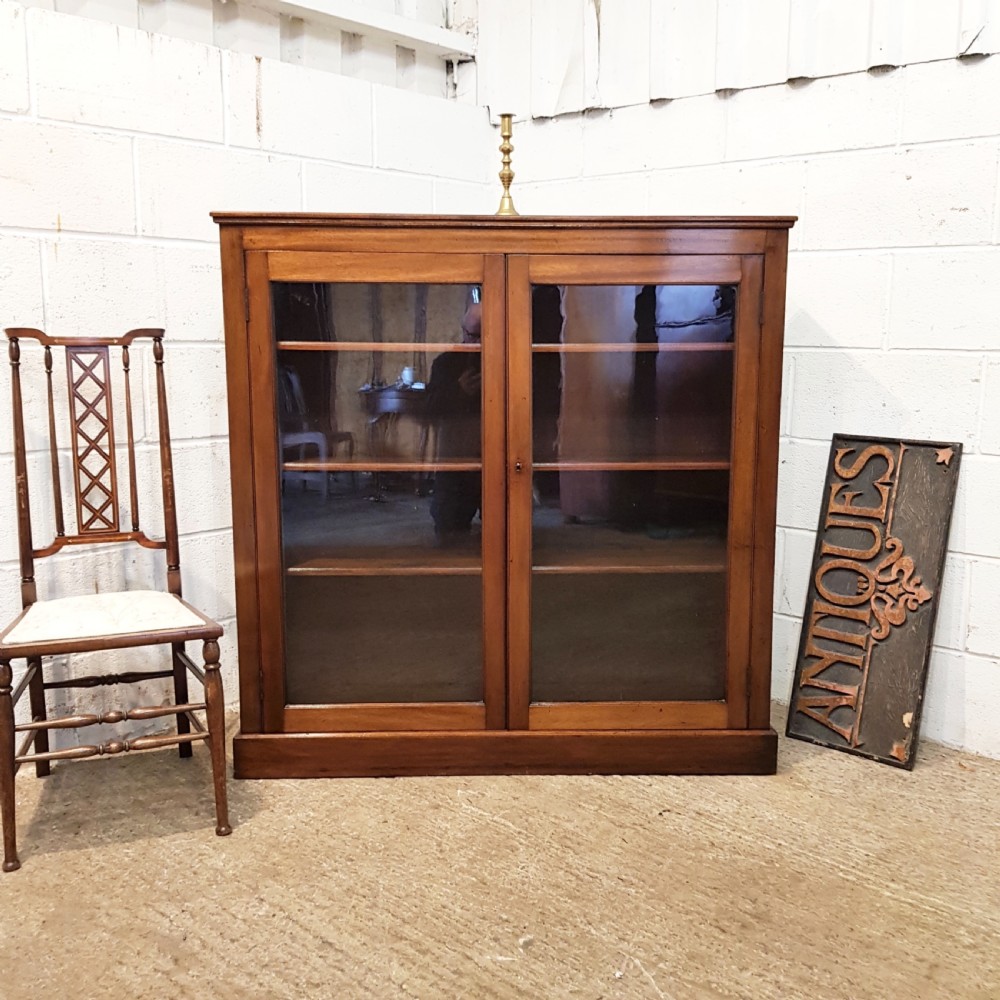 ANTIQUE LATE VICTORIAN MAHOGANY GLAZED BOOKCASE C1890