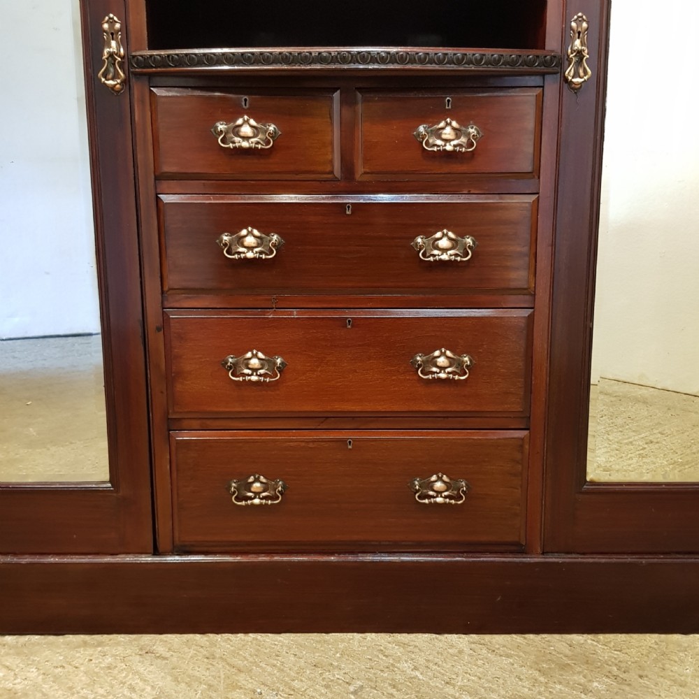 ANTIQUE LATE VICTORIAN CUBAN MAHOGANY TRIPLE  WARDROBE BY MAPLE & CO C1890 View II