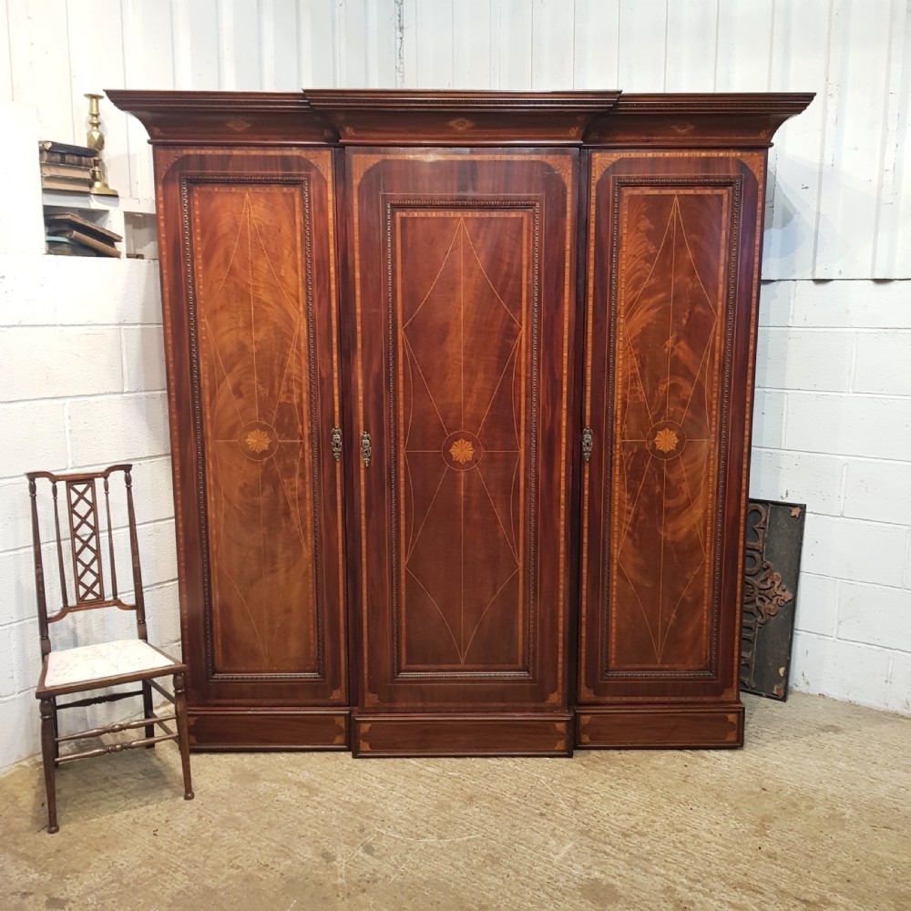 ANTIQUE LATE VICTORIAN REGENCY INLAID MAHOGANY TRIPLE BREAKFRONT WARDROBE C1890