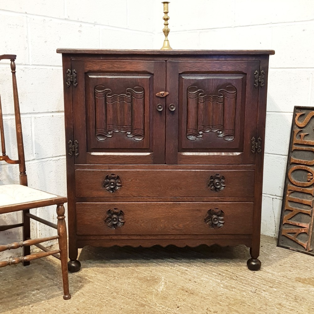 ANTIQUE CARVED OAK LINEN FOLD TALLBOY C1920