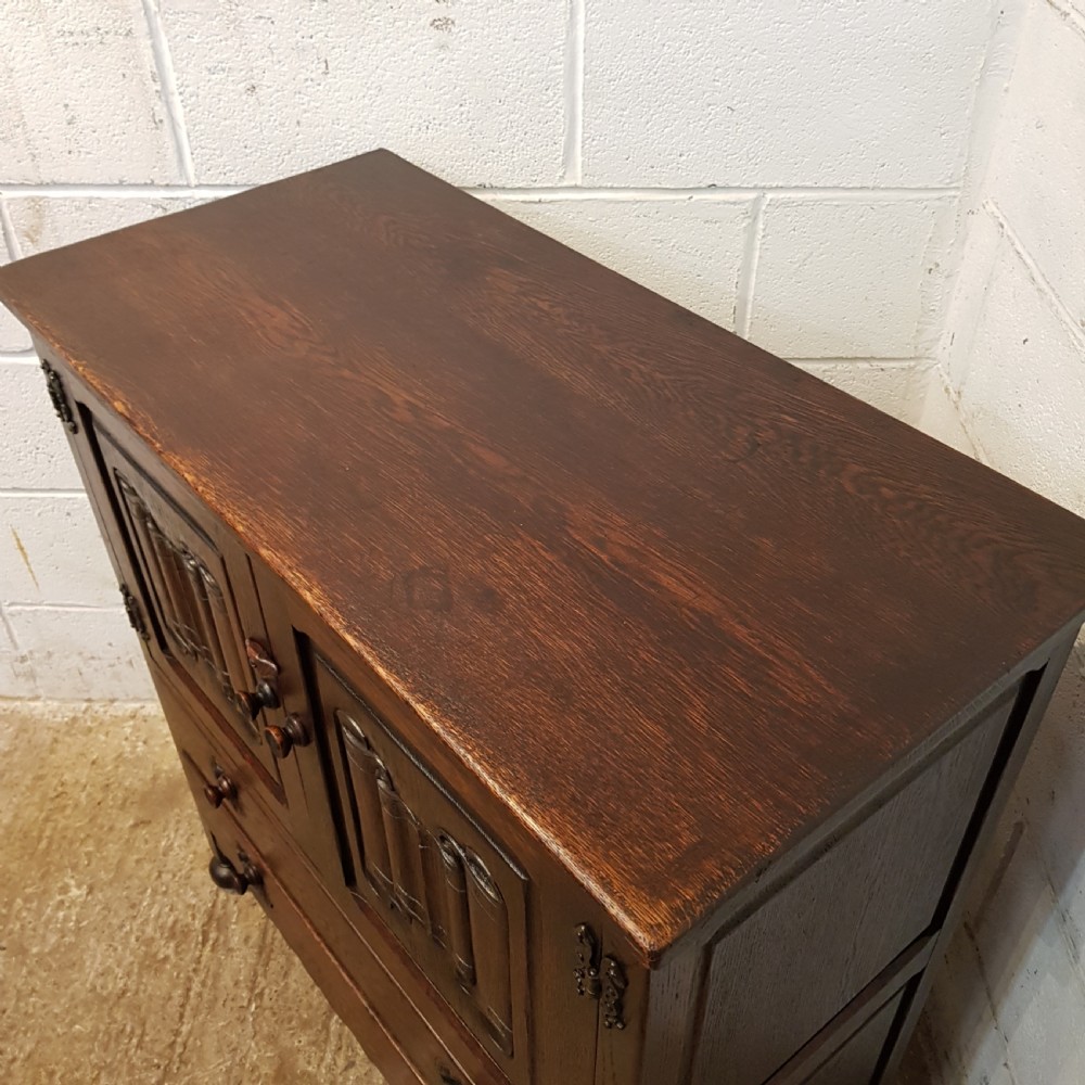 ANTIQUE CARVED OAK LINEN FOLD TALLBOY C1920 View II