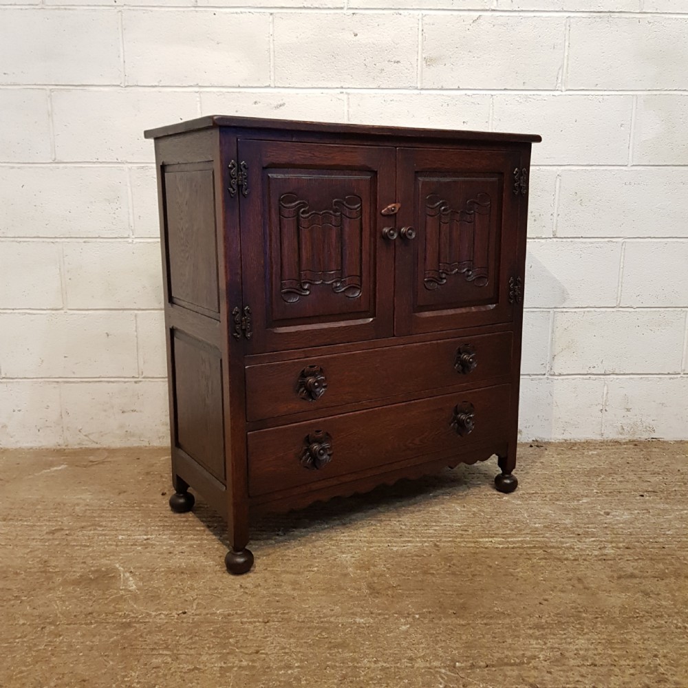 ANTIQUE CARVED OAK LINEN FOLD TALLBOY C1920 View V