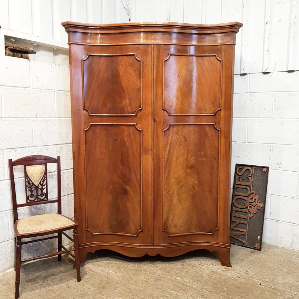 ANTIQUE EDWARDIAN MAHOGANY SERPENTINE FRONTED DOUBLE WARDROBE c1900