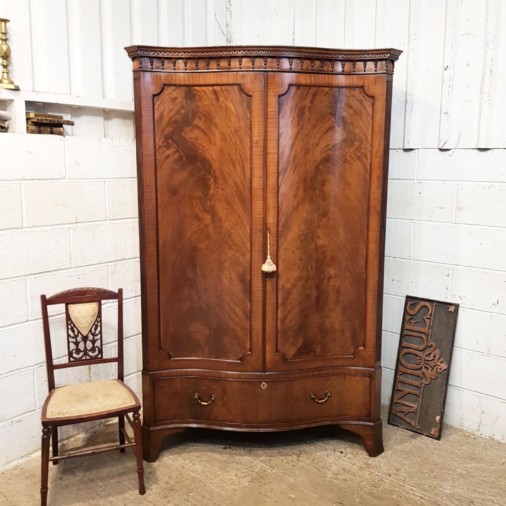 ANTIQUE EDWARDIAN SERPENTINE SHAPED MAHOGANY DOUBLE WARDROBE C1900
