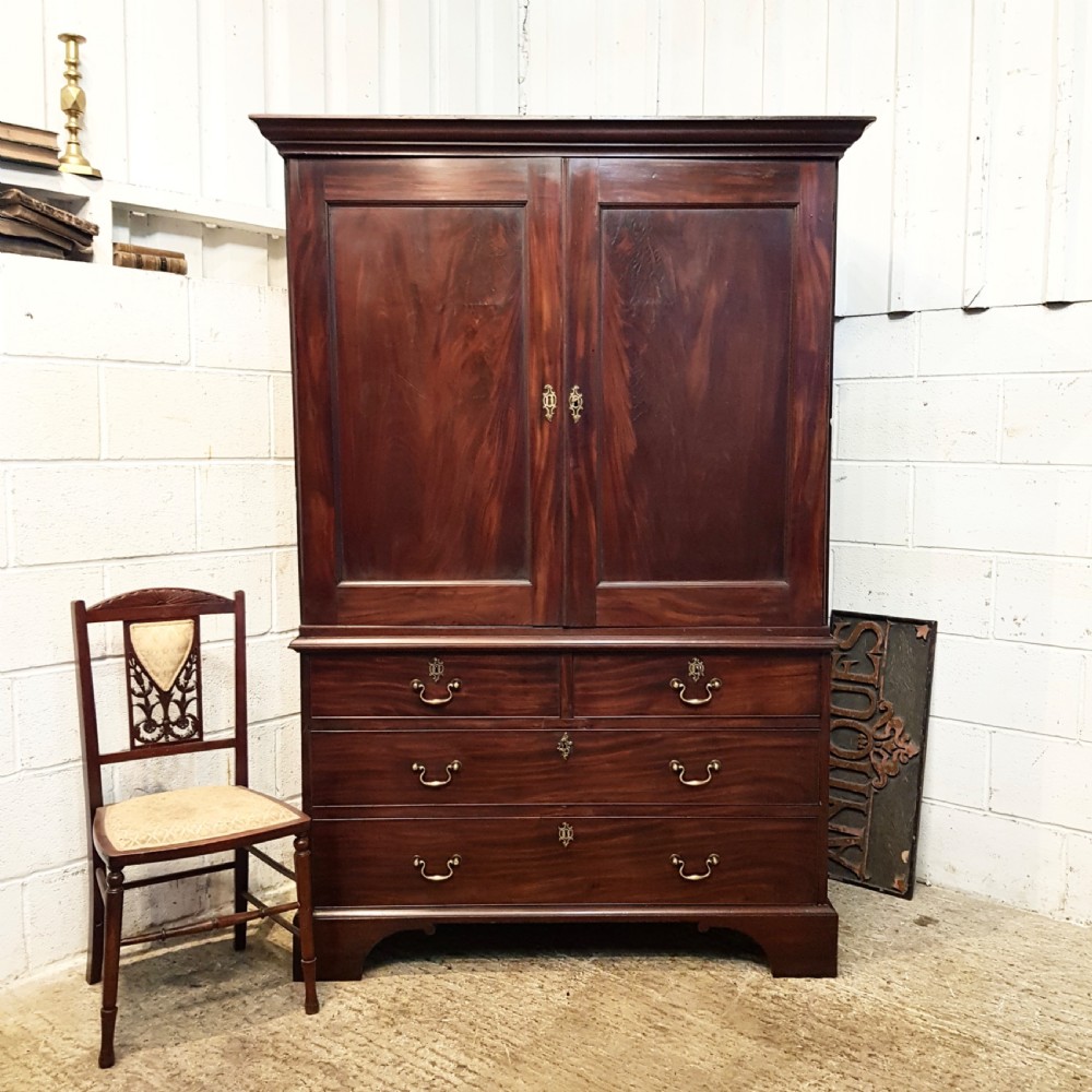 ANTIQUE REGENCY CUBAN MAHOGANY CLOTHES PRESS C1820