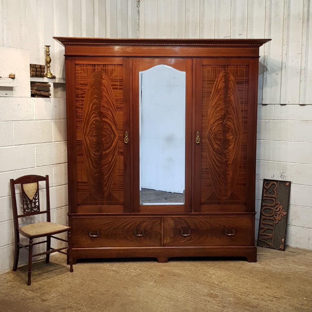 ANTIQUE VICTORIAN FIGURED MAHOGANY TRIPLE WARDROBE C1880