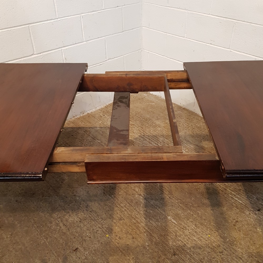 ANTIQUE VICTORIAN MAHOGANY EXTENDING DINING TABLE C1880 & SEATS UP TO TEN  View IV