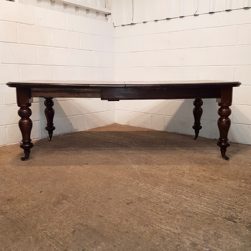 ANTIQUE VICTORIAN MAHOGANY EXTENDING DINING TABLE C1880 & SEATS UP TO TEN  View VIII