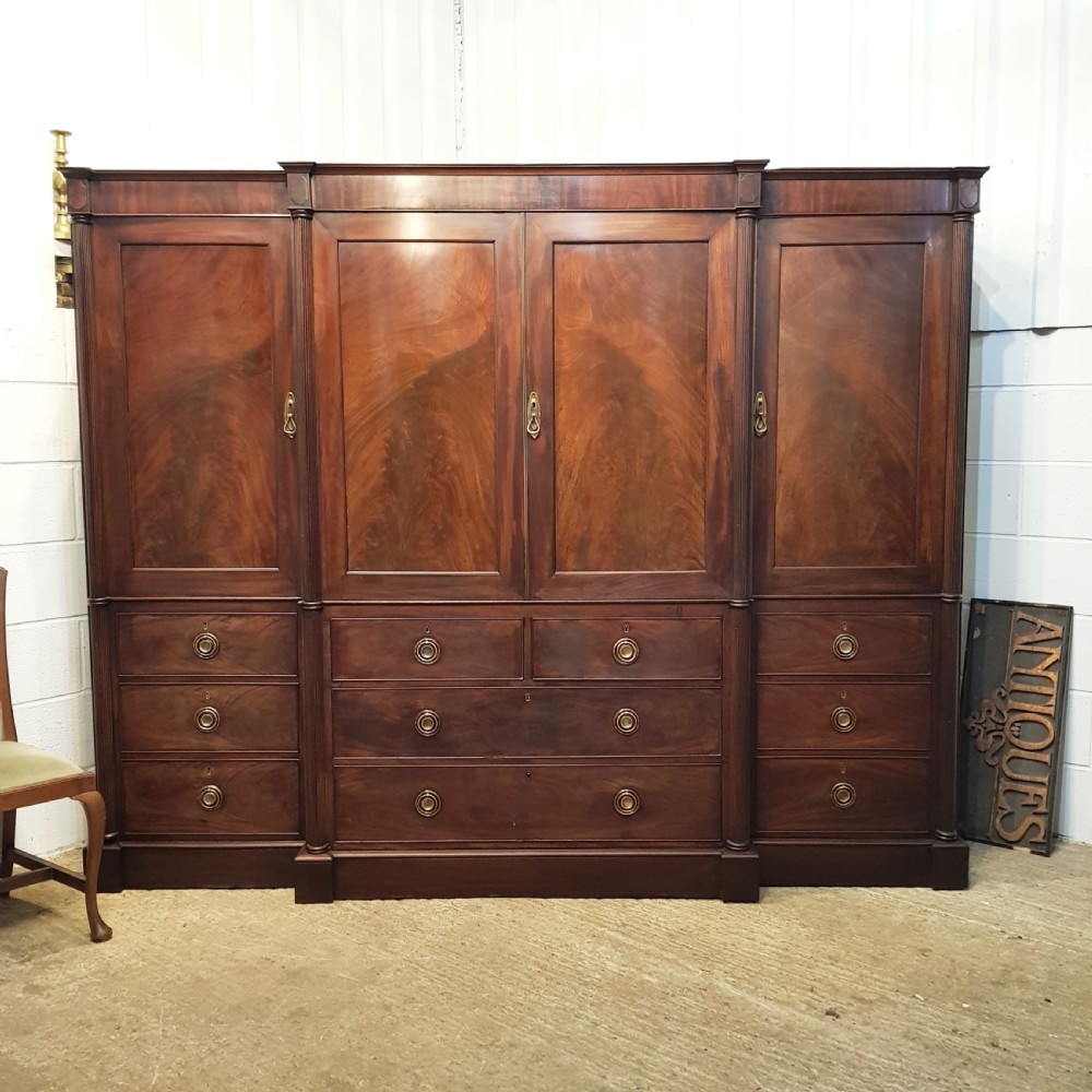 ANTIQUE REGENCY MAHOGANY BREAKFRONT FOUR DOOR WARDROBE C1820