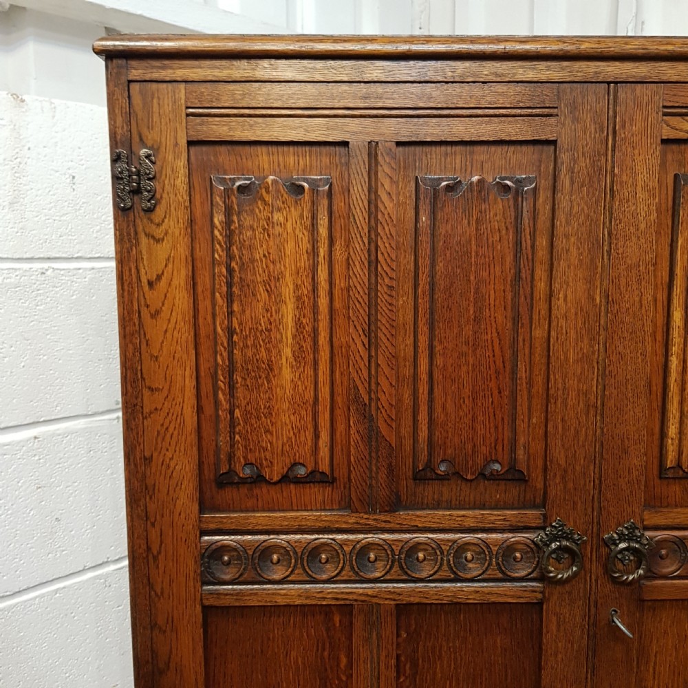 ANTIQUE OAK LINEN FOLD TALLBOY C1920 View II