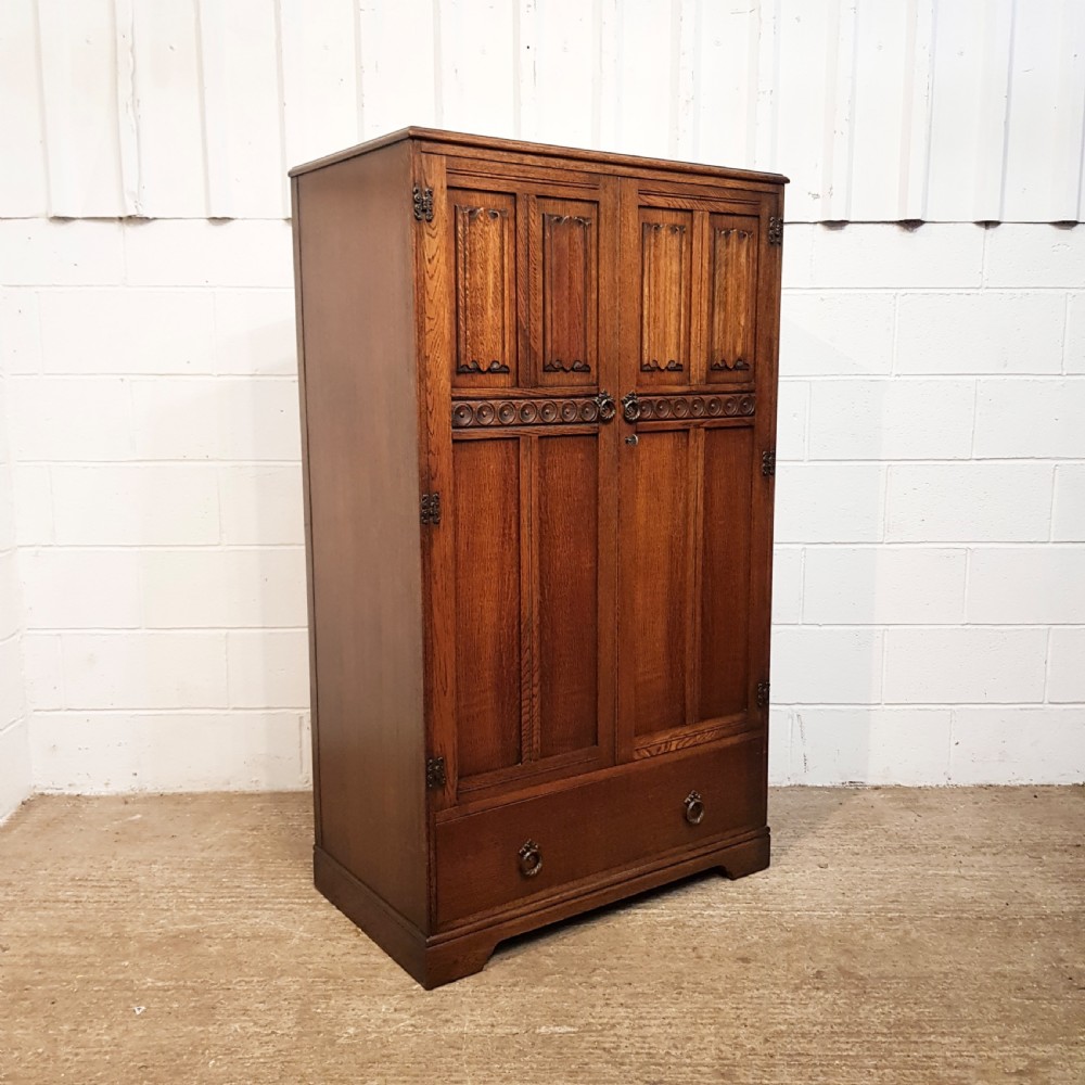 ANTIQUE OAK LINEN FOLD TALLBOY C1920 View III
