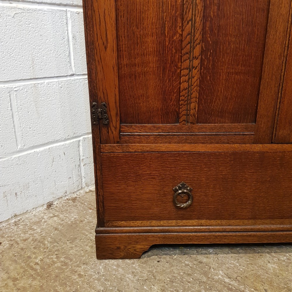ANTIQUE OAK LINEN FOLD TALLBOY C1920 View V