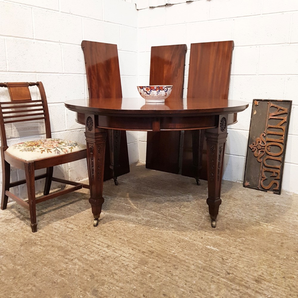 ANTIQUE EDWARDIAN MAHOGANY EXTENDING DINING TABLE BY MAPLE AND CO- C1900 View IV