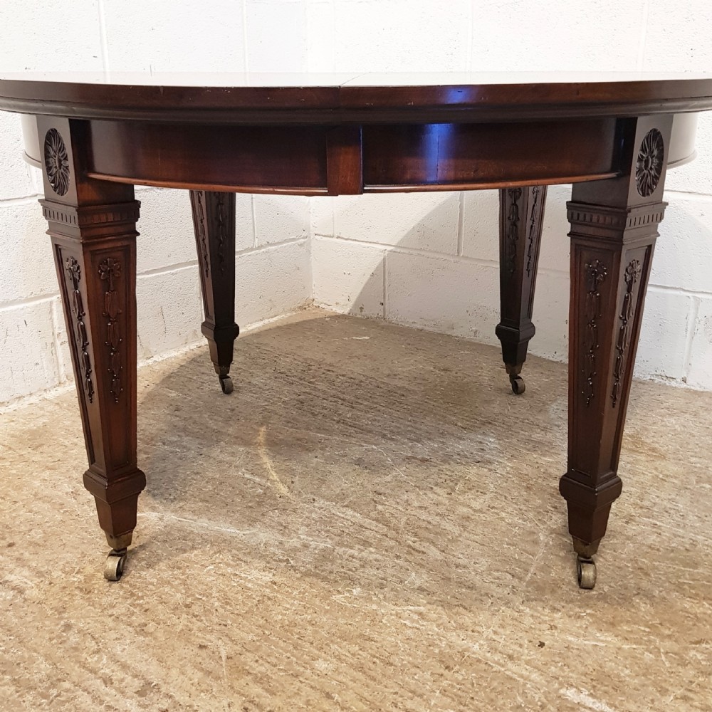ANTIQUE EDWARDIAN MAHOGANY EXTENDING DINING TABLE BY MAPLE AND CO- C1900 View V