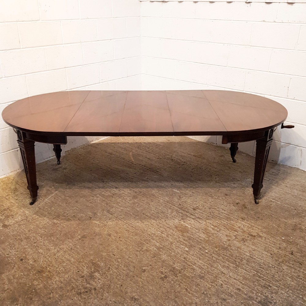 ANTIQUE EDWARDIAN MAHOGANY EXTENDING DINING TABLE BY MAPLE AND CO- C1900 View VI