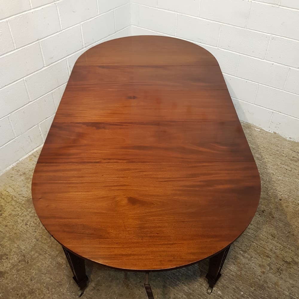 ANTIQUE EDWARDIAN MAHOGANY EXTENDING DINING TABLE BY MAPLE AND CO- C1900 View VII