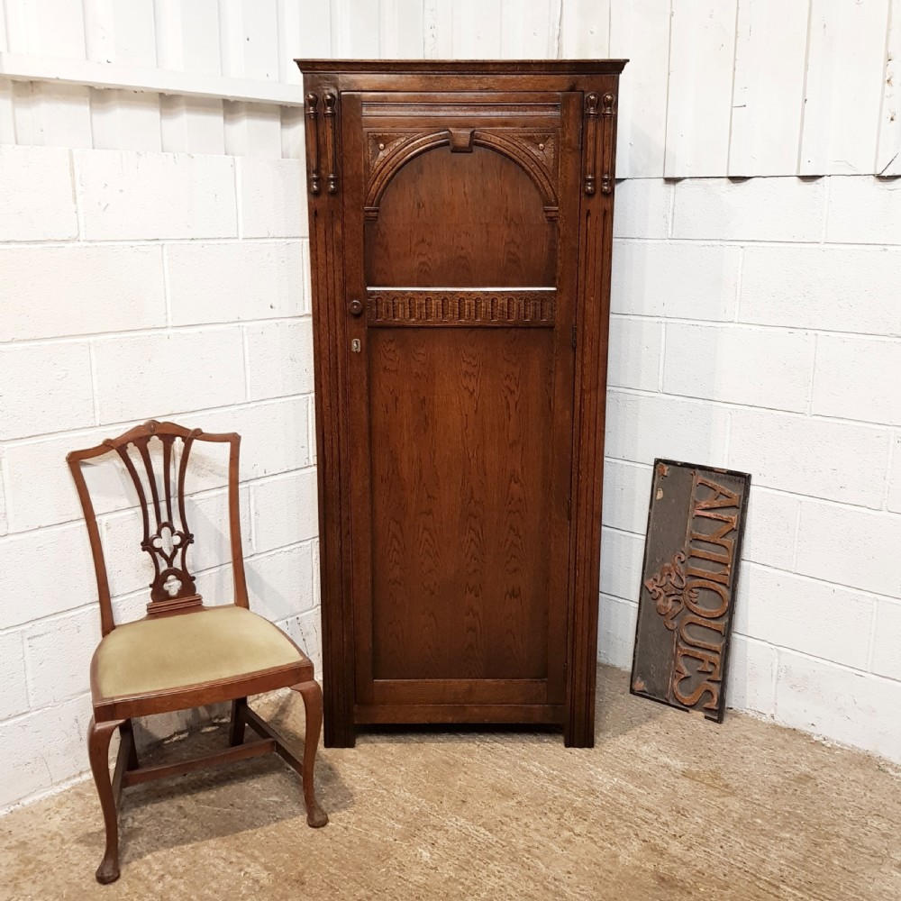 ANTIQUE CARVED OAK SINGLE WARDROBE C1920
