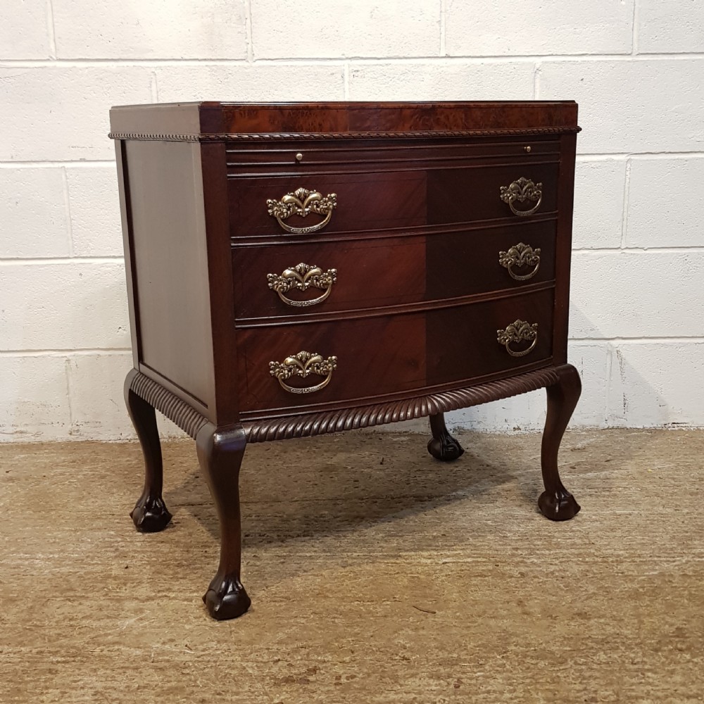 ANTIQUE MAHOGANY BOW FRONT CHEET OF DRAWERS WITH WRITING SLIDE C1920 View II
