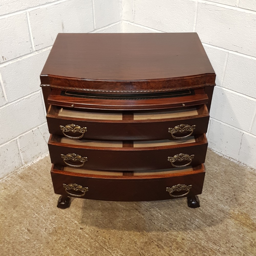 ANTIQUE MAHOGANY BOW FRONT CHEET OF DRAWERS WITH WRITING SLIDE C1920 View IV