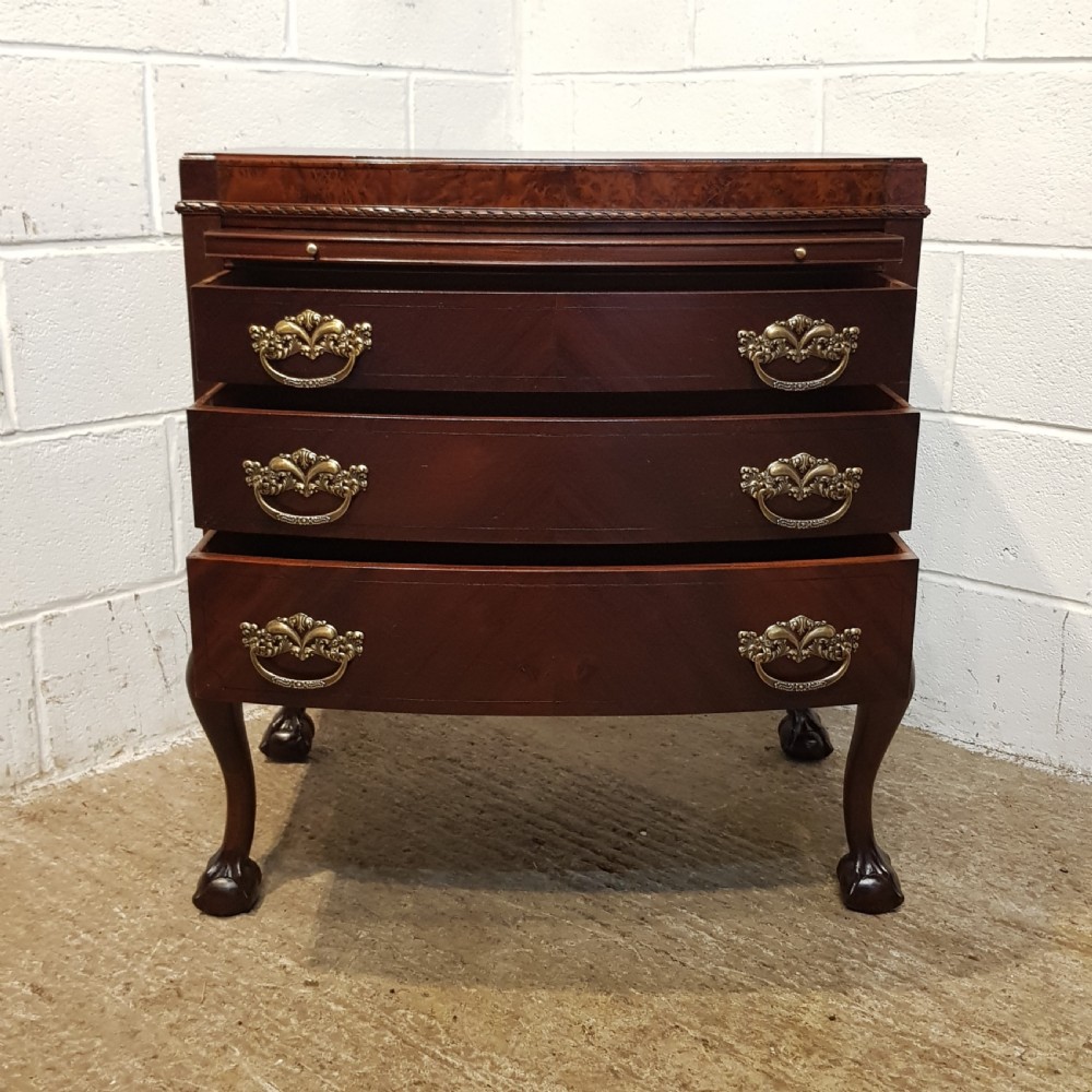 ANTIQUE MAHOGANY BOW FRONT CHEET OF DRAWERS WITH WRITING SLIDE C1920 View VI
