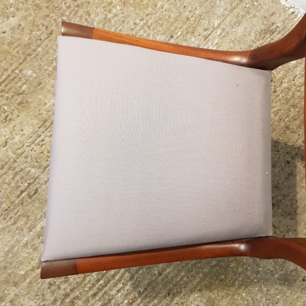 A set of six Victorian mahogany dining chairs featuring open balloon back frames, turned front legs, and neutral upholstered seats. View VIII