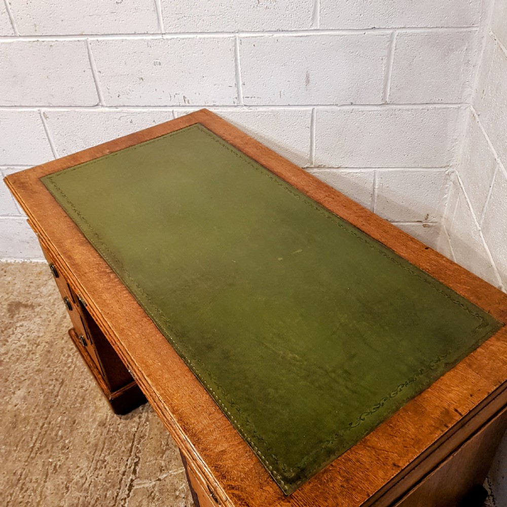 AN ANTIQUE EDWARDIAN OAK TWIN PEDESTAL DESK  View V