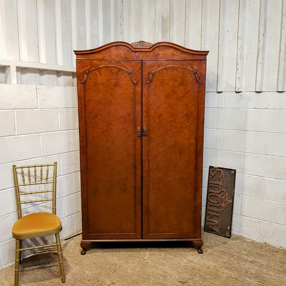 AN ANTIQUE BURR WALNUT DOUBLE WARDROBE C1920