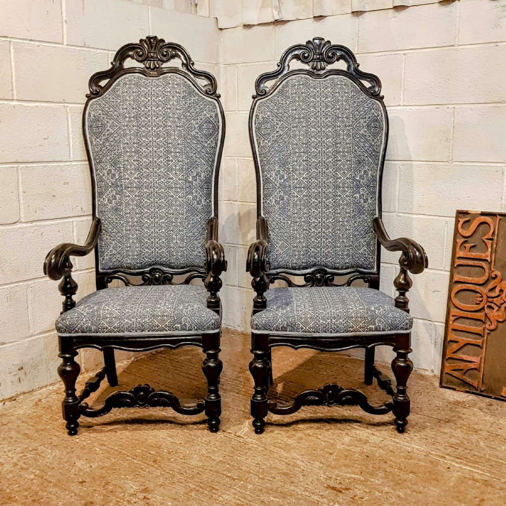 A PAIR OF ITALIAN ANTIQUE EBONISED OPEN HIGH BACK ARM CHAIRS C1900