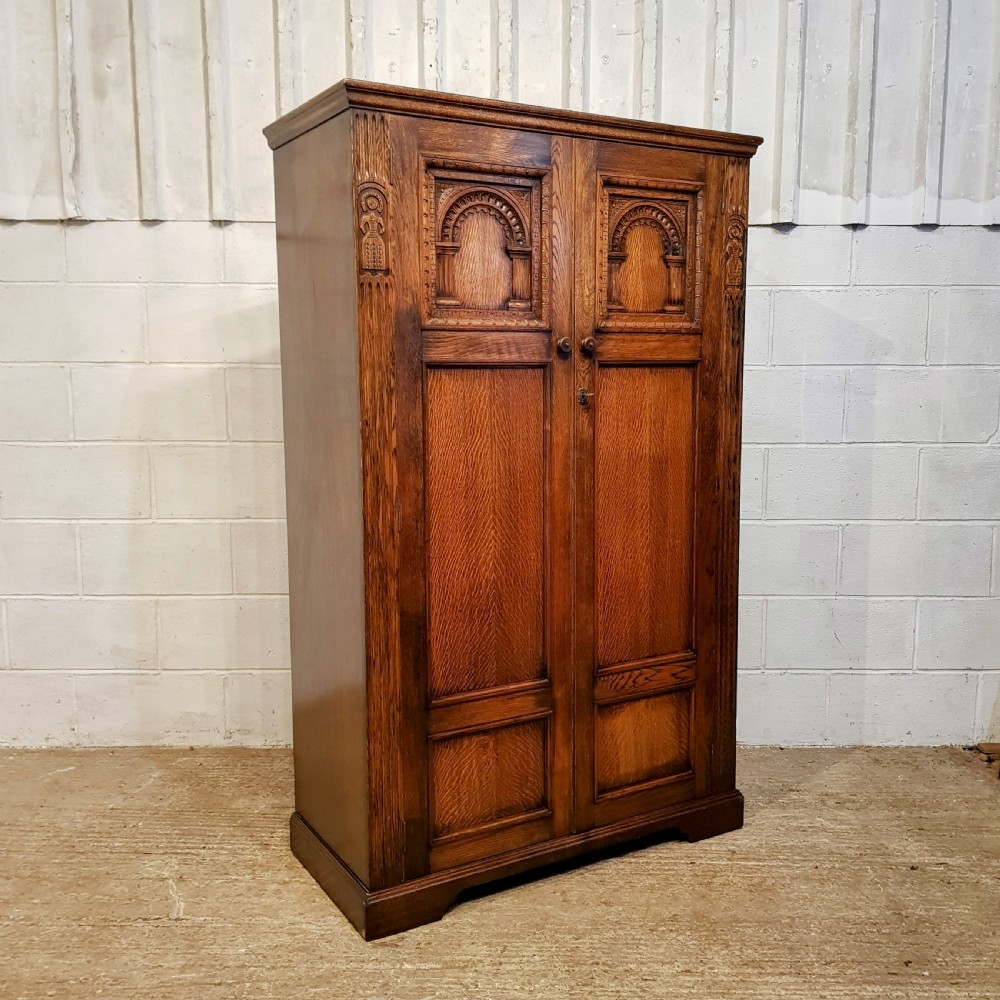 AN ANTIQUE OAK GENTLEMAN'S FITTED SMALL WARDROBE C1920 View II