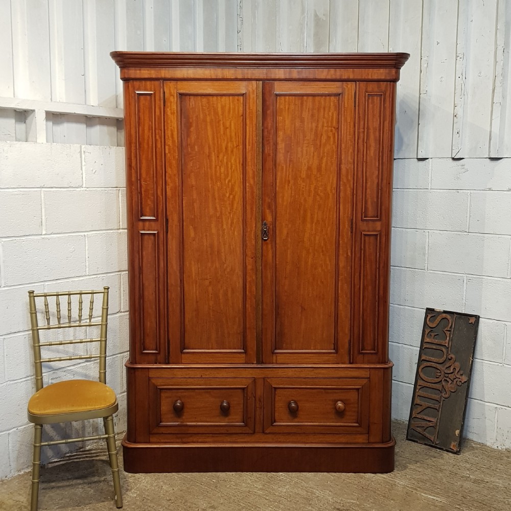 AN ANTIQUE VICTORIAN MAHOGANY DOUBLE WARDROBE C1880