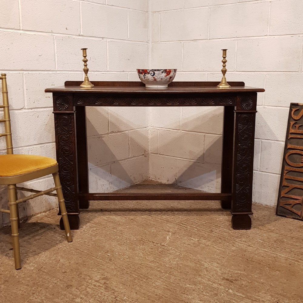 AN ANTIQUE OAK CARVED CONSOLE TABLE C1920