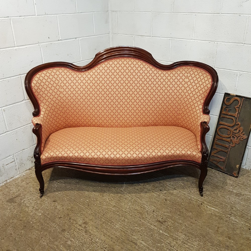 AN ANTIQUE FRENCH VICTORIAN MAHOGANY FRAMED SOFA C1890