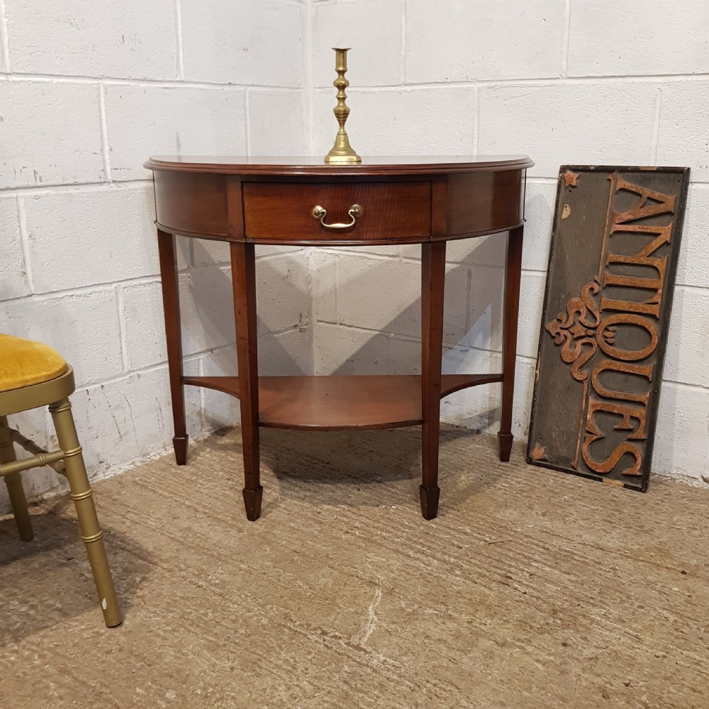 AN ANTIQUE EDWARDIAN MAHOGANY DEMI LUNE CONSOLE SIDE TABLE
