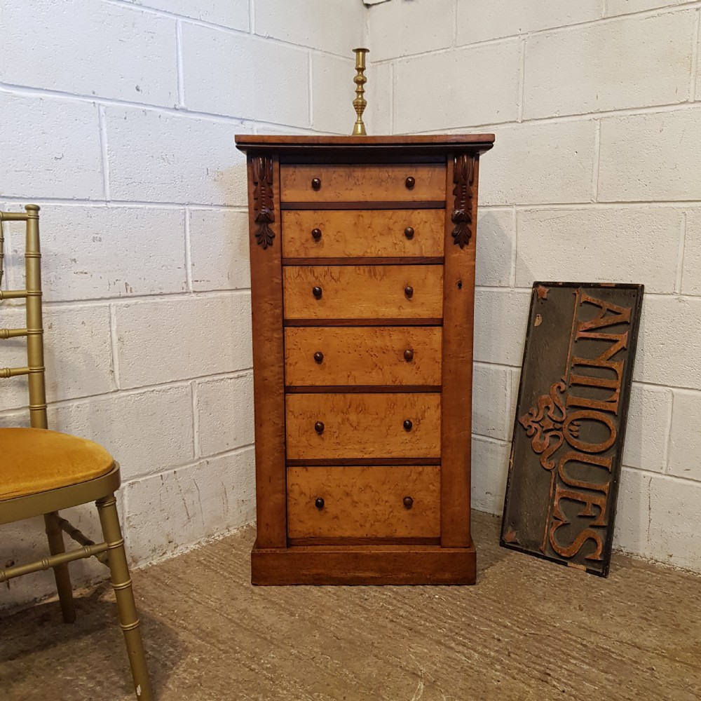 AN ANTIQUE SATINWOOD WELLINGTON CHEST C1890